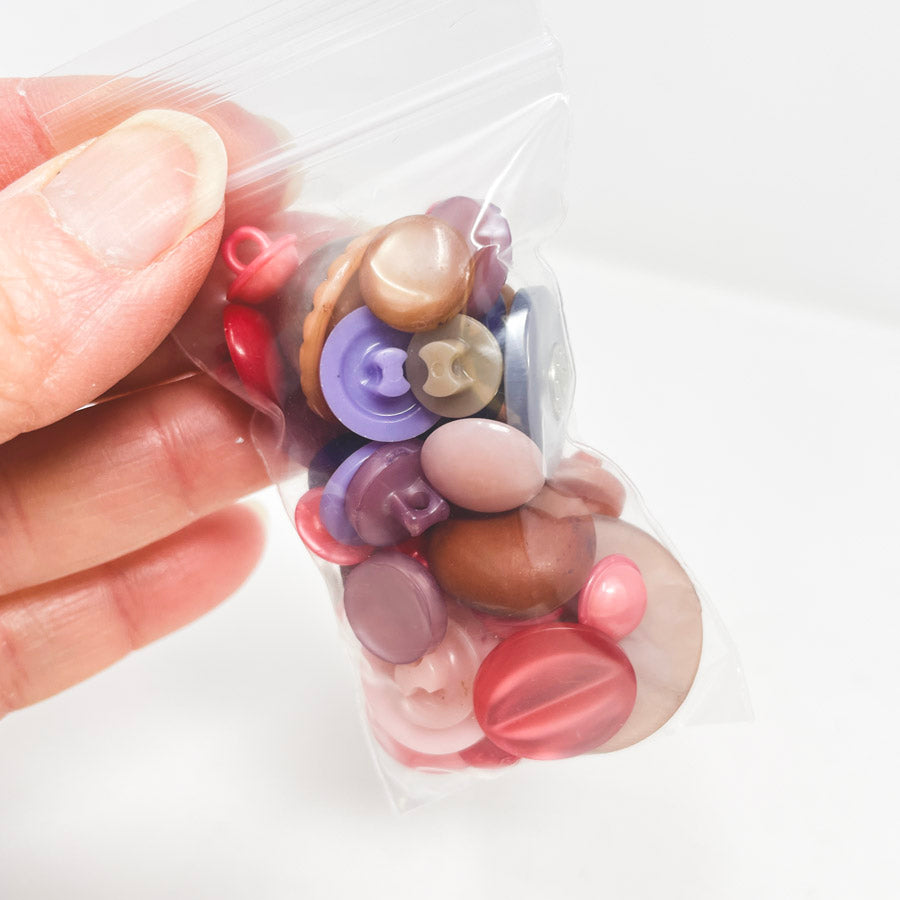 Small Bag of Pink and Purple Shank Buttons
