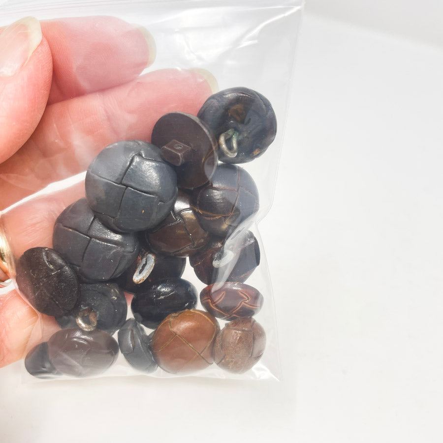 Small Bag of Black and Brown Shank Buttons