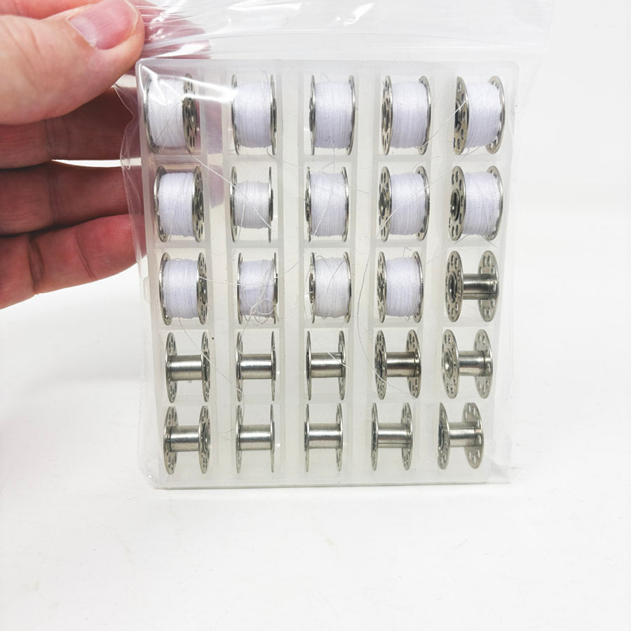 25 Metal Bobbins in Tray