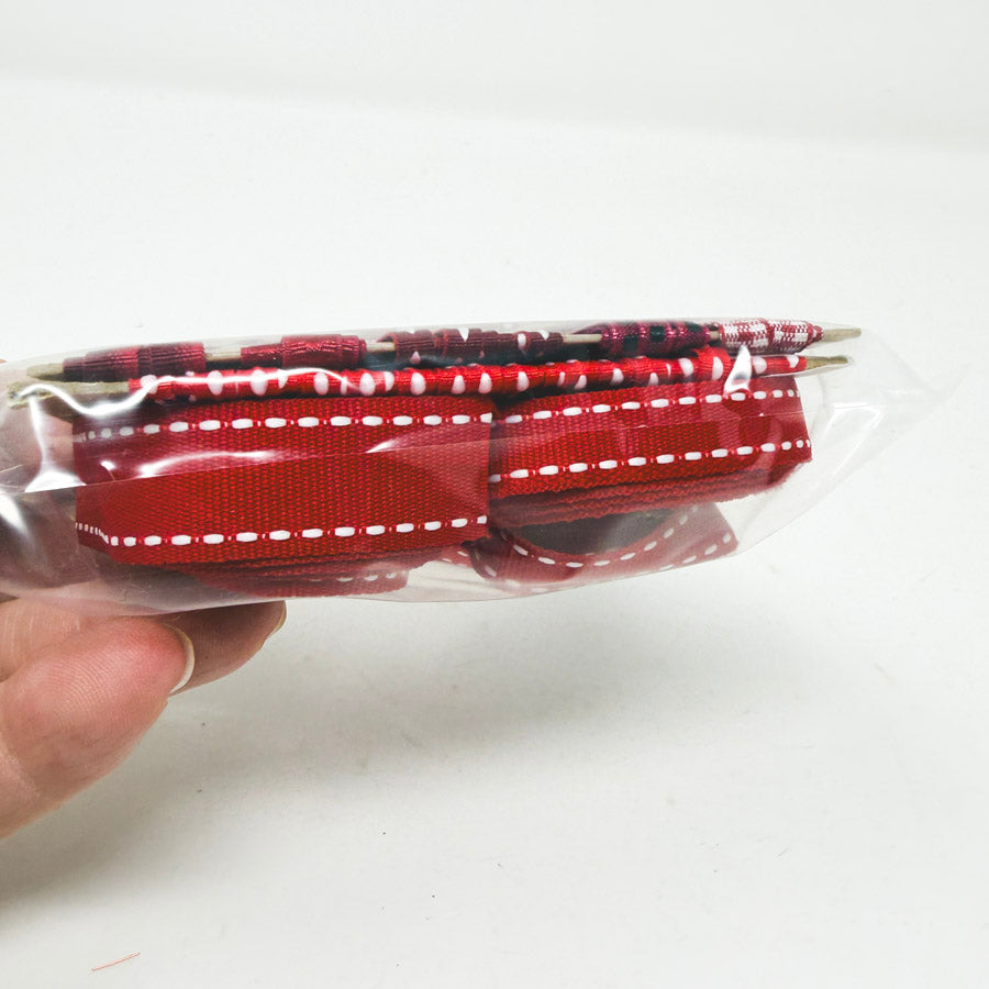 Bundle of Red Ribbon Remnants