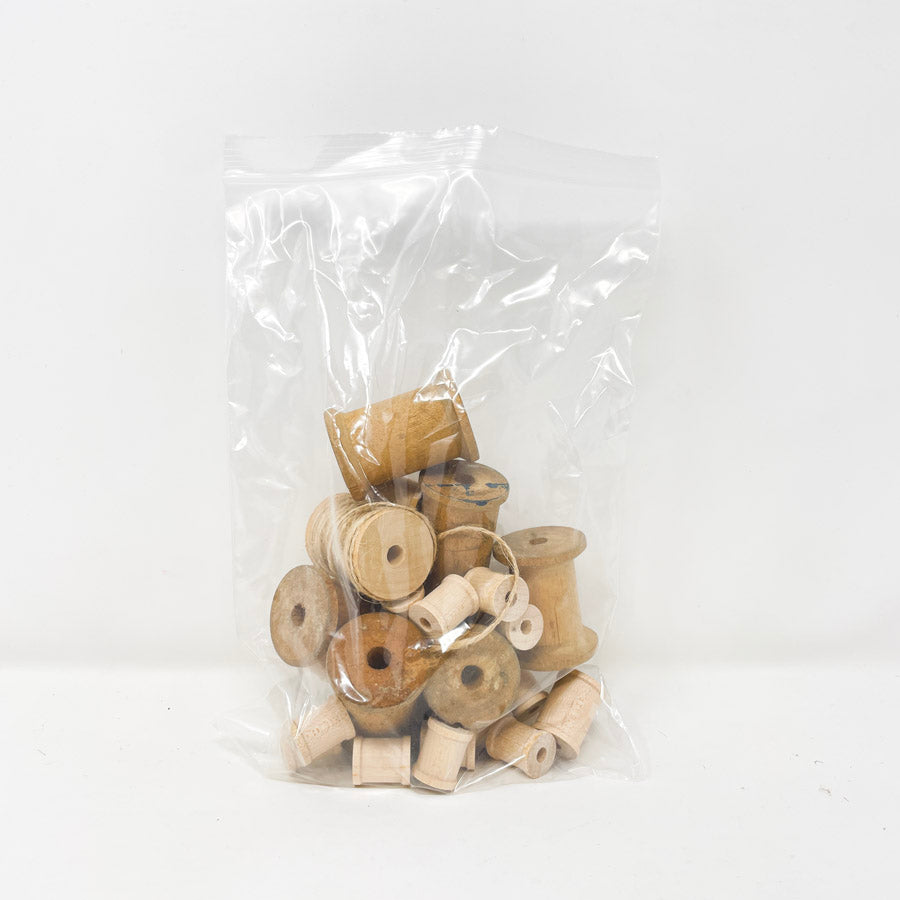 Bundle of Wood Thread Spools