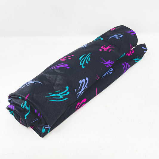 1 yard - Black with Bright Swishes Polyester Fabric