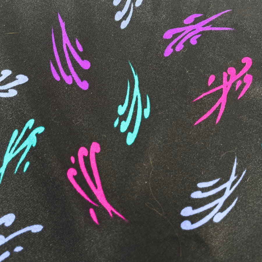 1 yard - Black with Bright Swishes Polyester Fabric