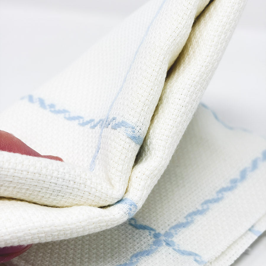Soft White Aida with Baby Blue Grid – appx. 16 Count – 53" x 20"