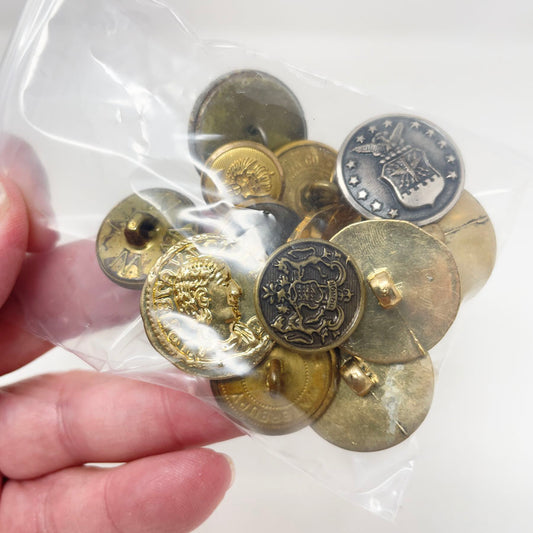 Bundle of Metallic Finish Seal Buttons