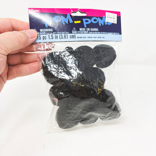 Pack of Black Pom Poms