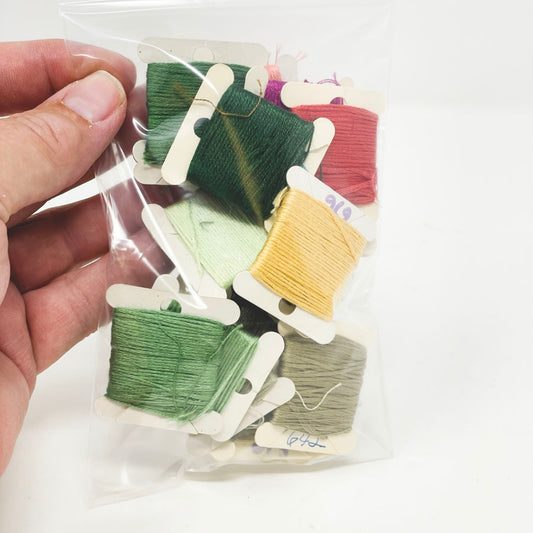 Bundle of Needlework Floss on Spools