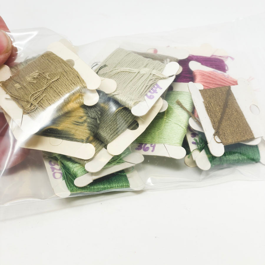 Bundle of Needlework Floss on Spools