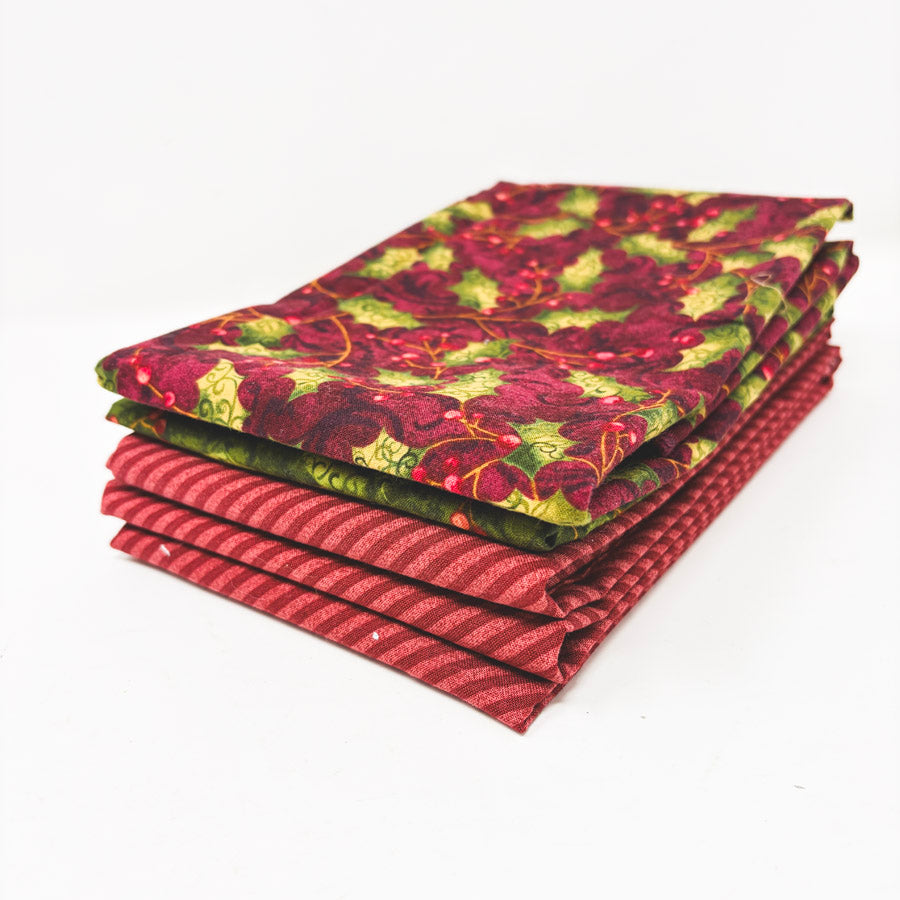 Stack of Festive Holiday Fabrics
