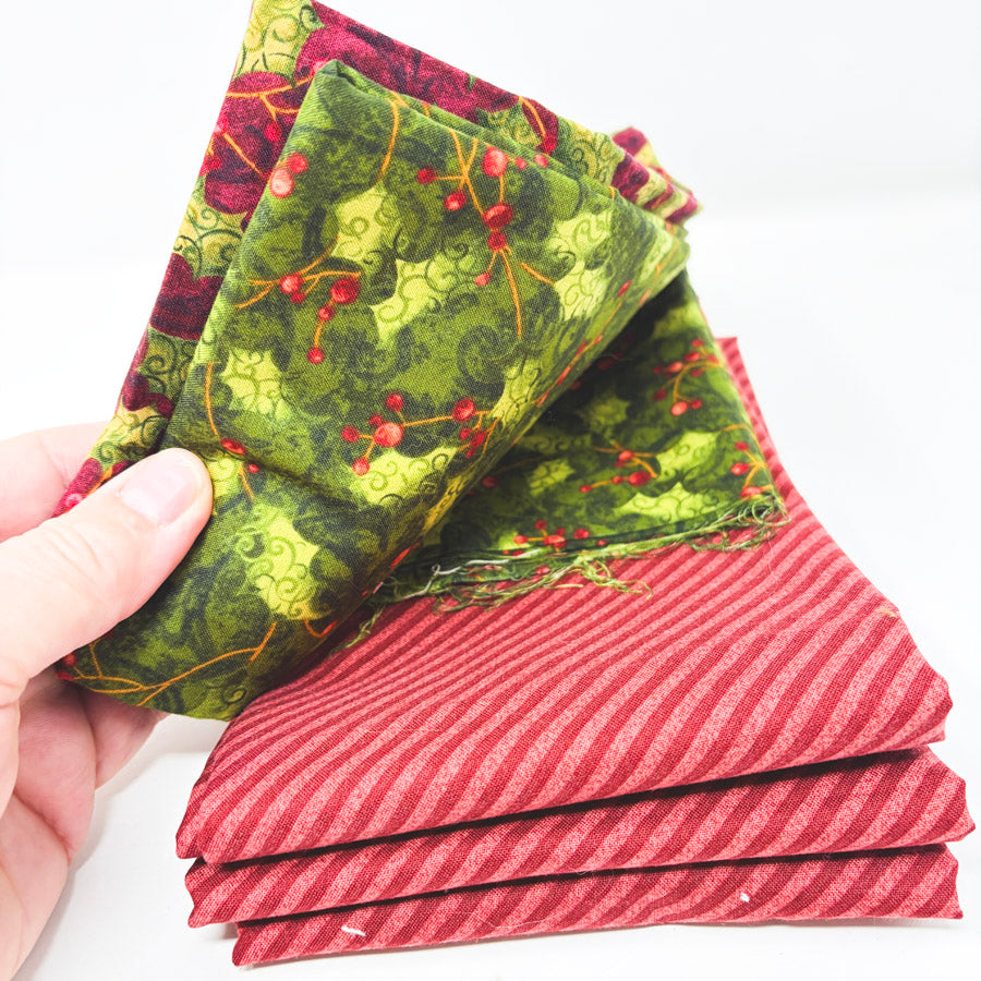 Stack of Festive Holiday Fabrics