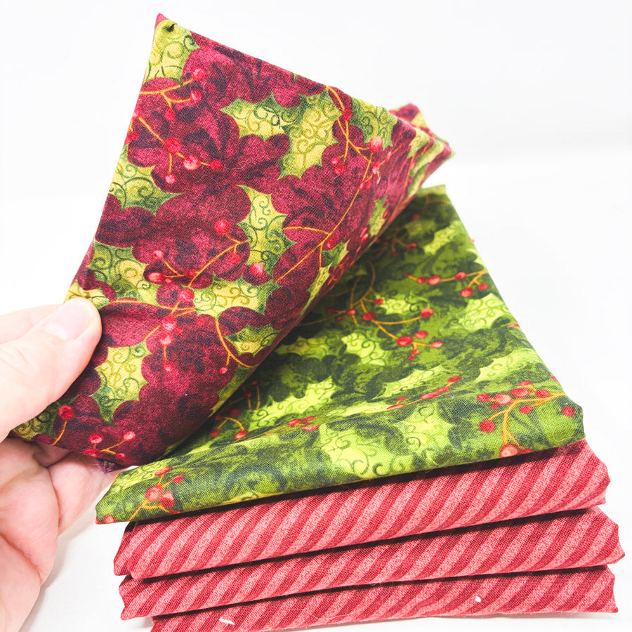 Stack of Festive Holiday Fabrics