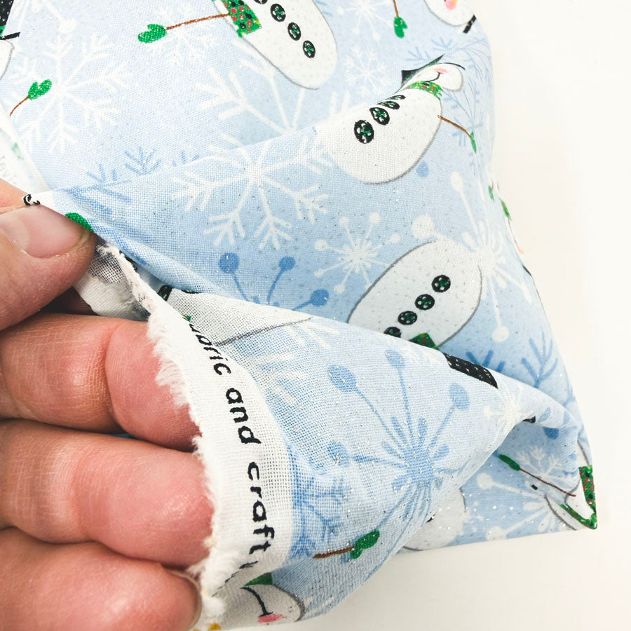 43" x 46" Glitter Stick Snowmen on Blue Cotton Fabric