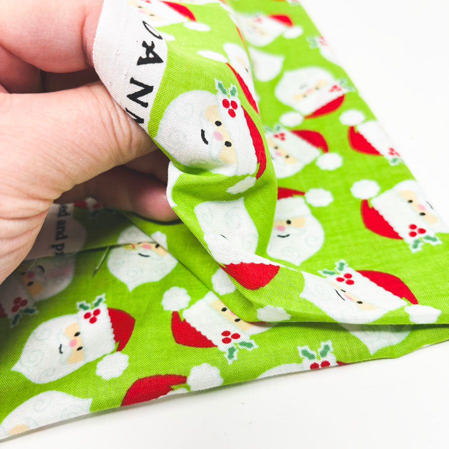42" x 1 yd Santa on Lime Green Lightweight Cotton Fabric