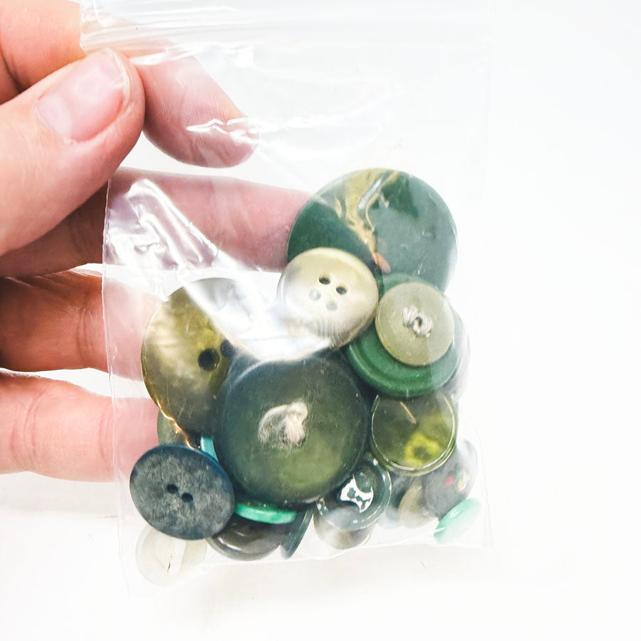 Medium Bag of Mixed Size Green Buttons
