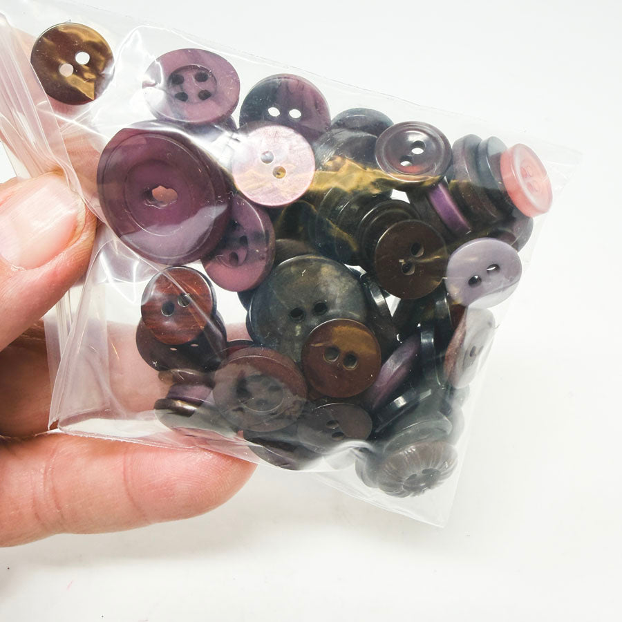 Medium Bag of Mixed Size Purple Buttons