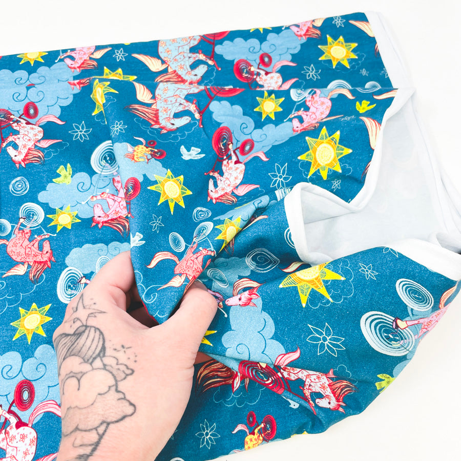 Appx 2 Yds Pegasus Rides a Bike! Cotton Fabric