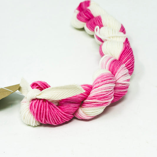 Unmarked Small Pink & White Yarn Skein