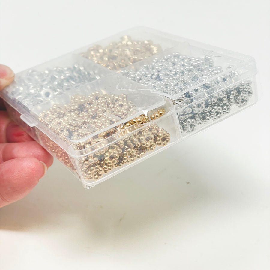 2 Boxes of Metallic Plastic Beads