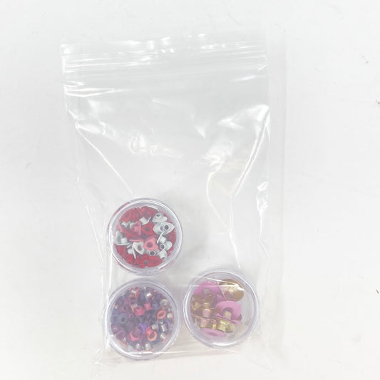 Bag of 3 different eyelets