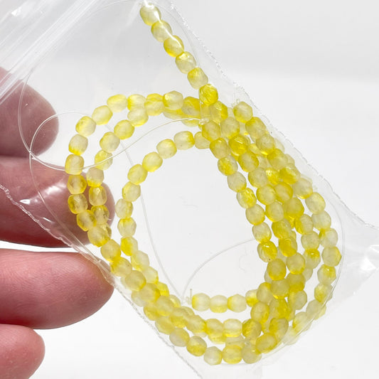 Yellow Faceted Glass Beads