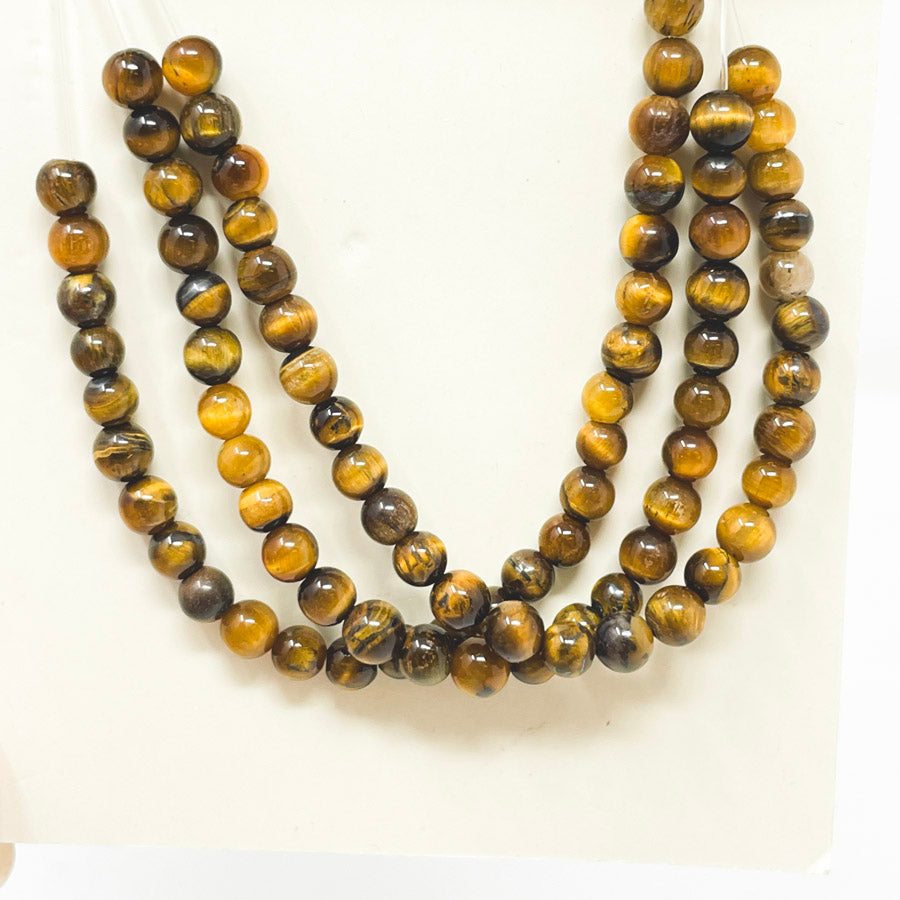 Traditions 4mm Round Tiger Eye Beads (1)