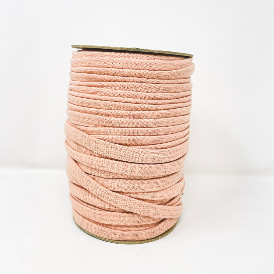 Spool of Peach Stretchy Binding