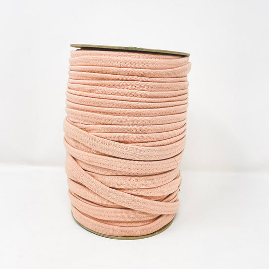 Spool of Peach Stretchy Binding