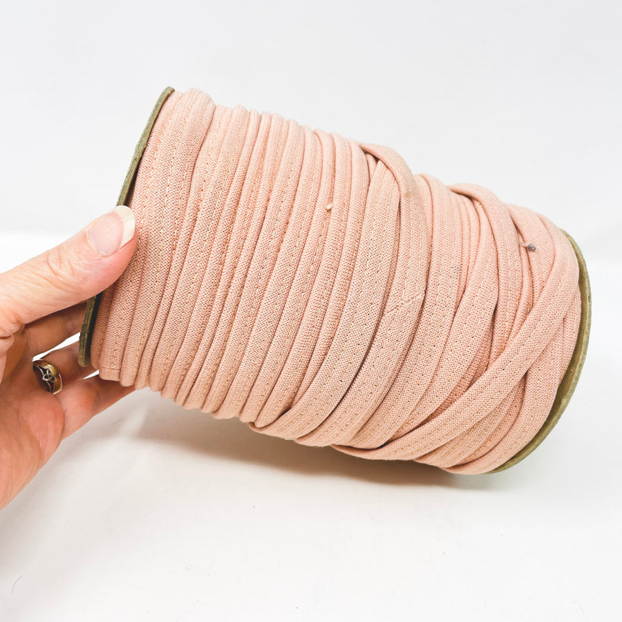 Spool of Peach Stretchy Binding